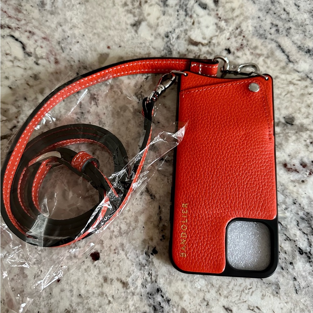 EMMA
Pebble Leather Crossbody Bandolier in orange/Silver for iPhone 11 Pro